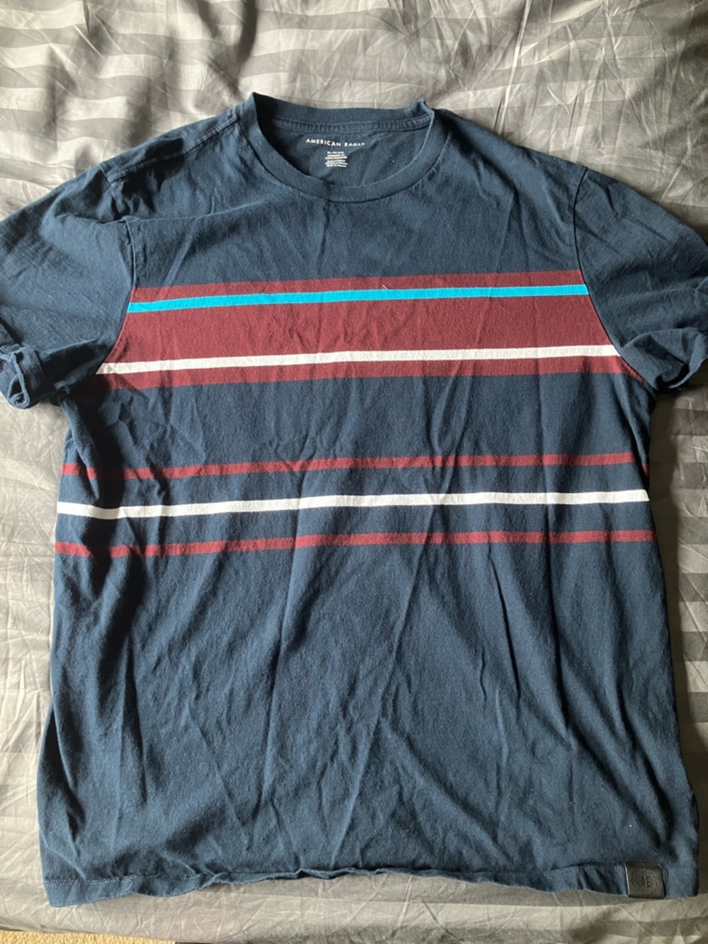 American Rag Navy Short Sleeve Stripe Tee with Burgundy & Aqua Accents